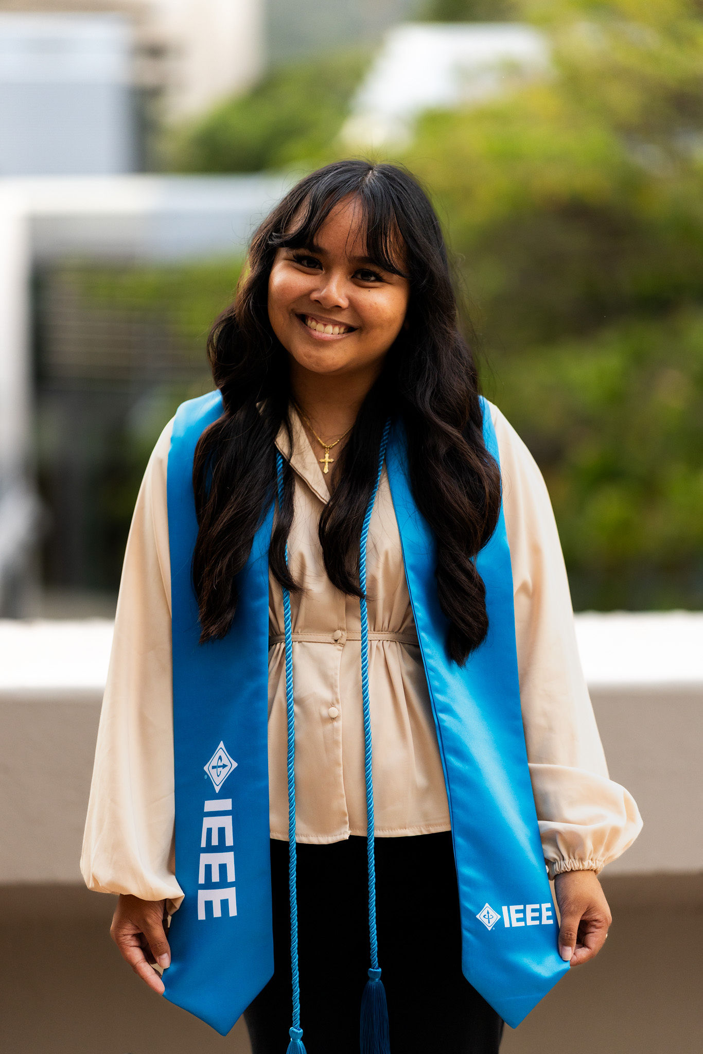 IEEE graduates wearing blue IEEE graduation regalia