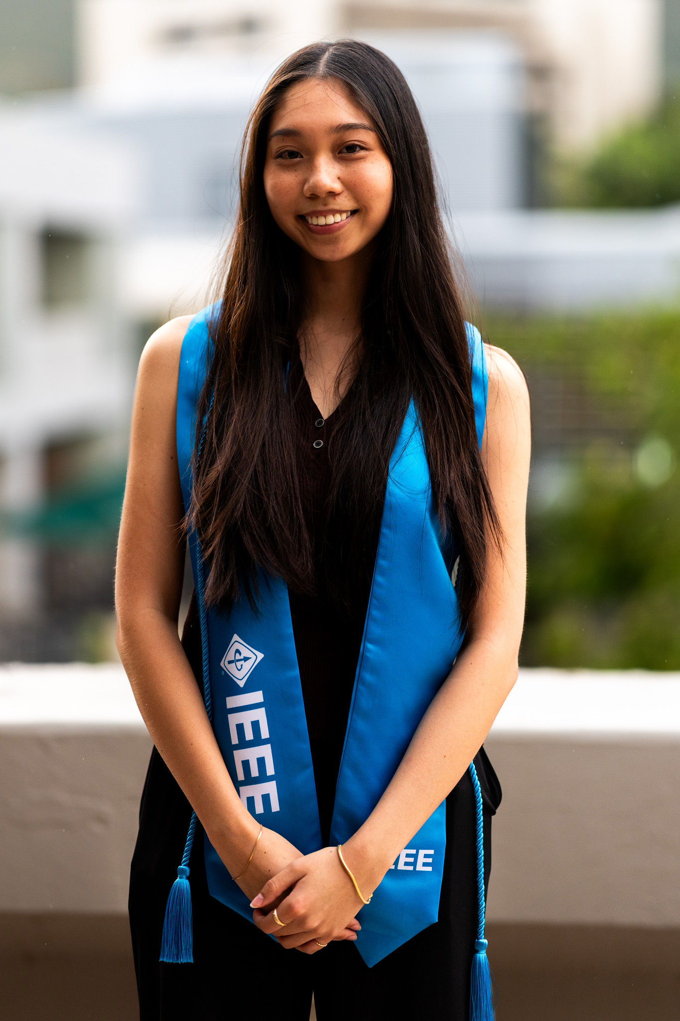 IEEE graduates wearing blue IEEE graduation regalia