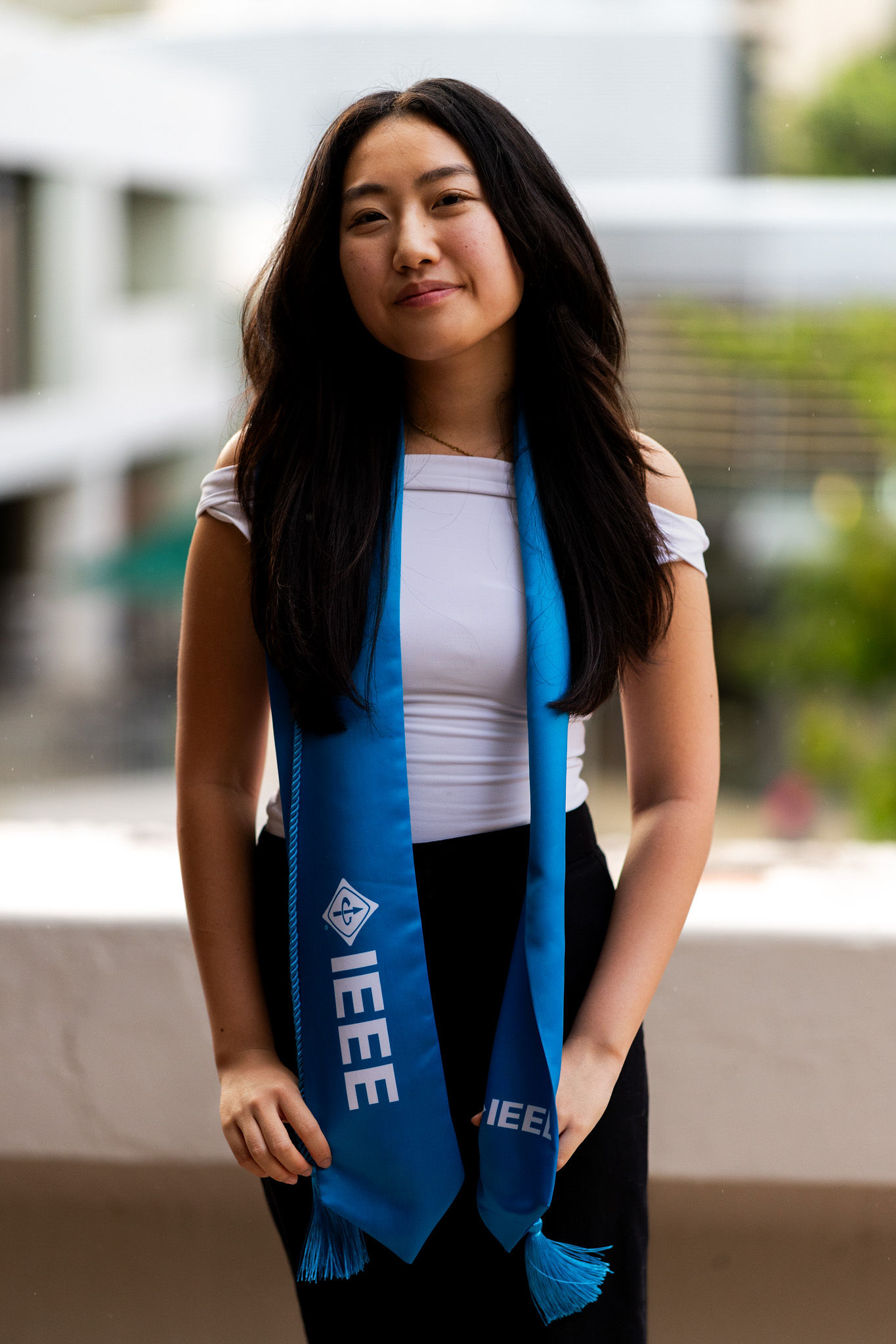 IEEE graduates wearing blue IEEE graduation regalia